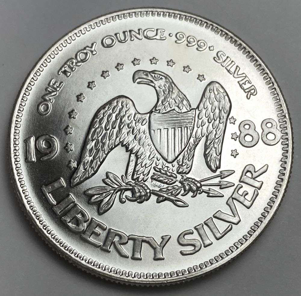 Rare 1988 A-Mark "Life Liberty Happiness" 1 ozt .999 Silver: Winner shall receive (1) coin precisely resembling the one shown here. (RR/B)