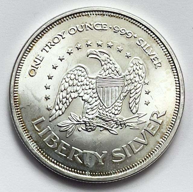 Liberty Silver A-Mark 1 ozt .999 Fine Silver Round: Winner shall receive the exact round shown here. (SJ/B)