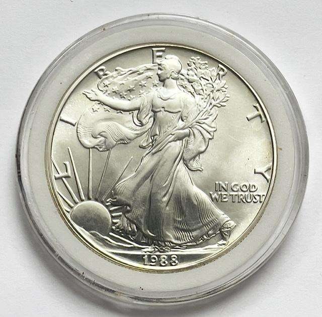 1988 American Silver Eagle in Capsule: Winner shall receive the exact coin shown here. (SJ/B)