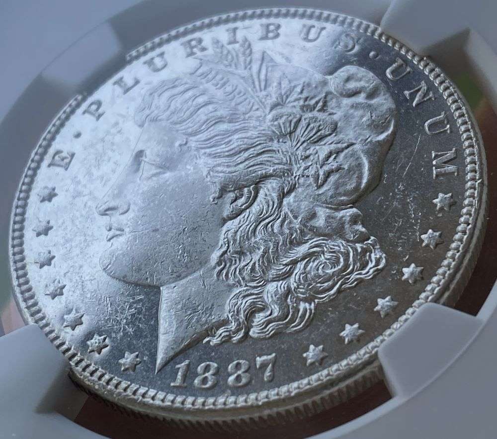 1887 Morgan Silver Dollar NGC Brilliant Uncirculated (1 of 6)