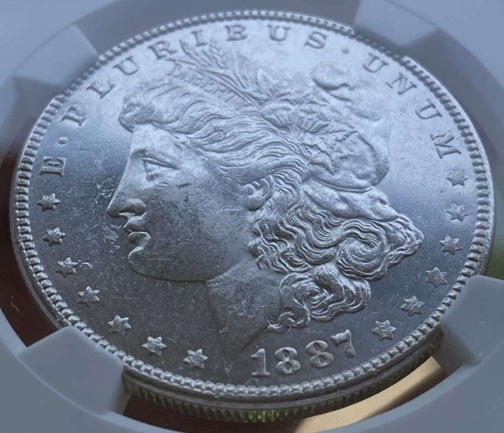 1887 Morgan Silver Dollar NGC Brilliant Uncirculated (1 of 6)