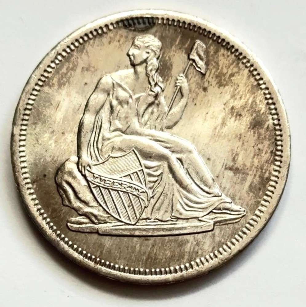 Toned Seated Liberty Design 1 ozt .999 Silver: Winner shall receive the exact round shown here. (SJ/FT)