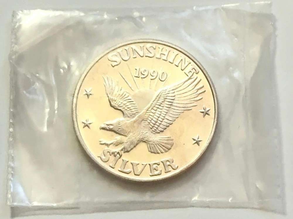 Toned 1990 Sunshine Mining 1 ozt .999 Silver (1 of 3)