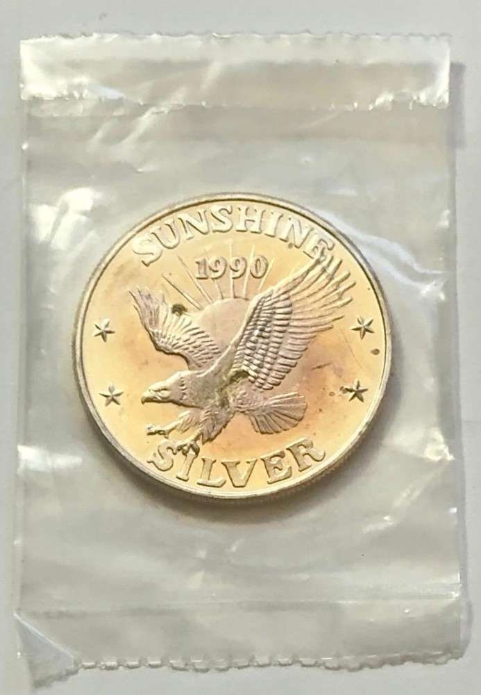 Toned 1990 Sunshine Mining 1 ozt .999 Silver (1 of 3)