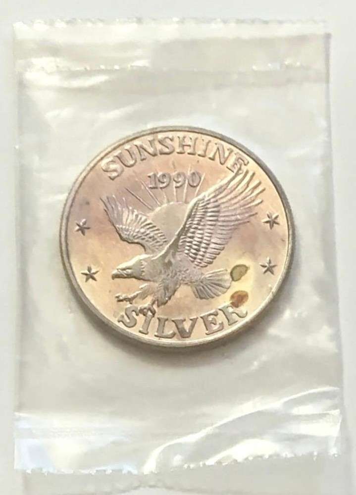 Toned 1990 Sunshine Mining 1 ozt .999 Silver (1 of 3)