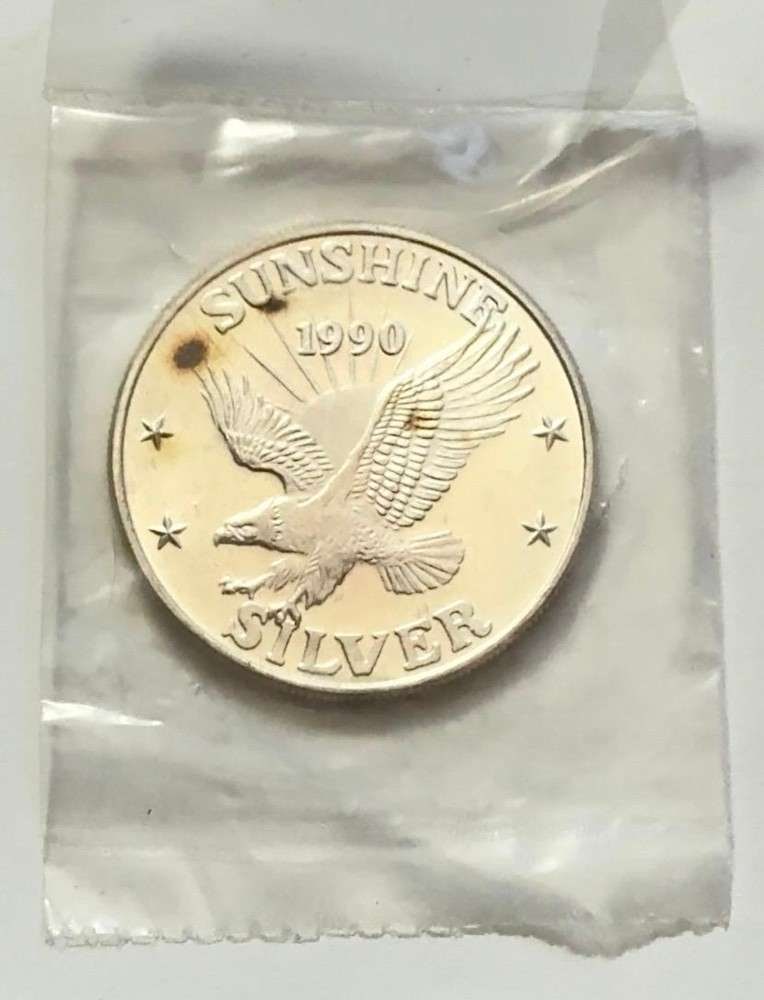 Toned 1990 Sunshine Mining 1 ozt .999 Silver (1 of 3)