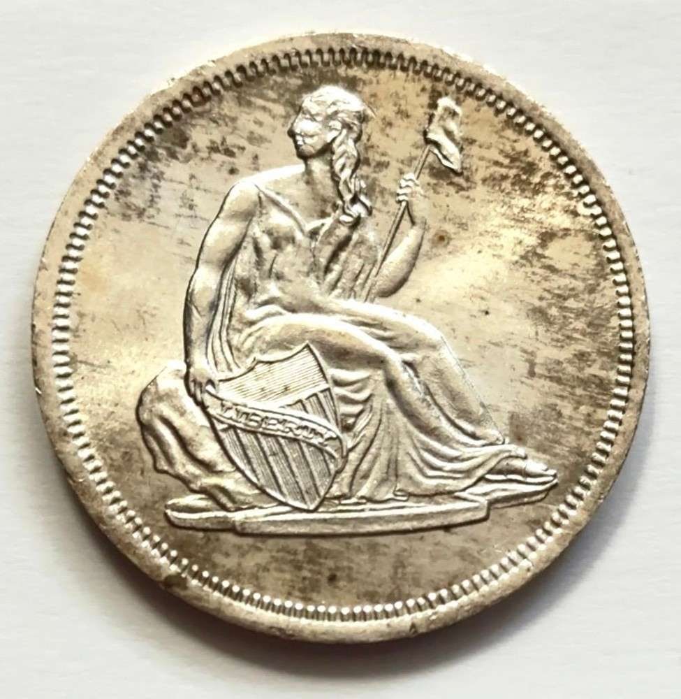 Toned Seated Liberty Design 1 ozt .999 Silver: Winner shall receive the exact round shown here. (SJ/FT)