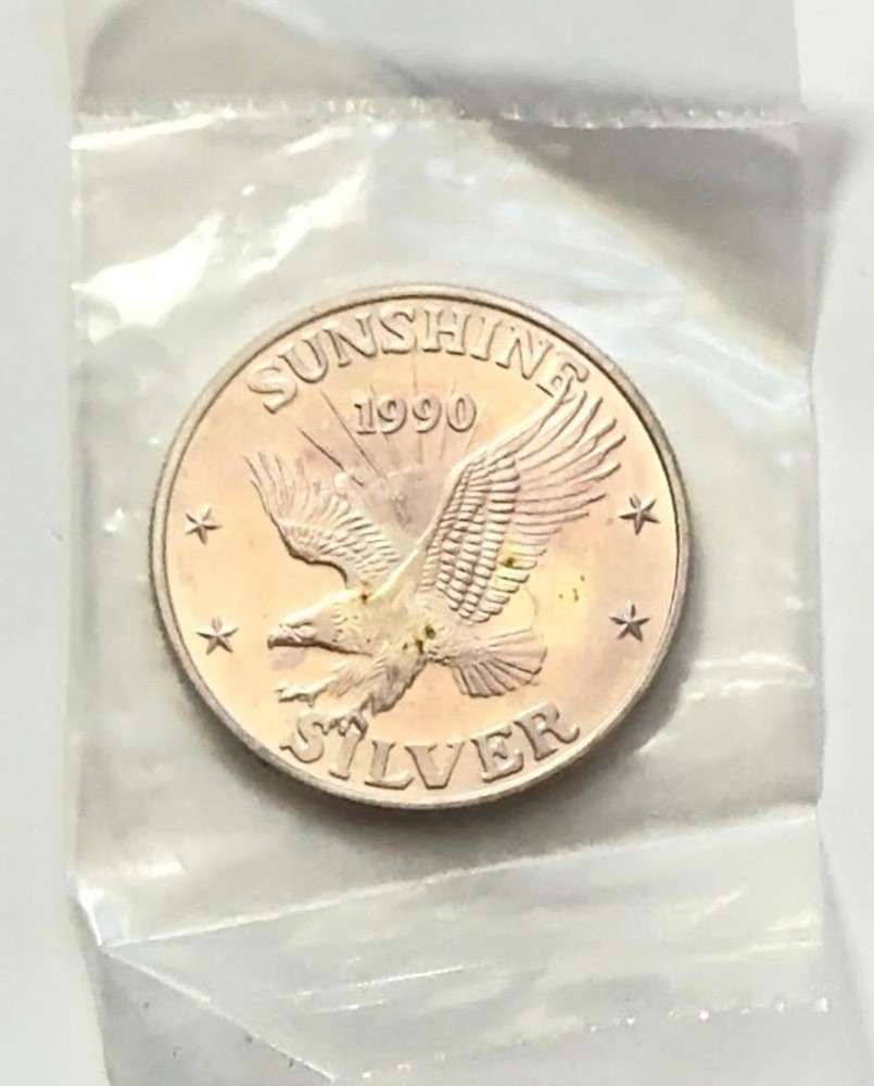 Toned 1990 Sunshine Mining 1 ozt .999 Silver (1 of 3)