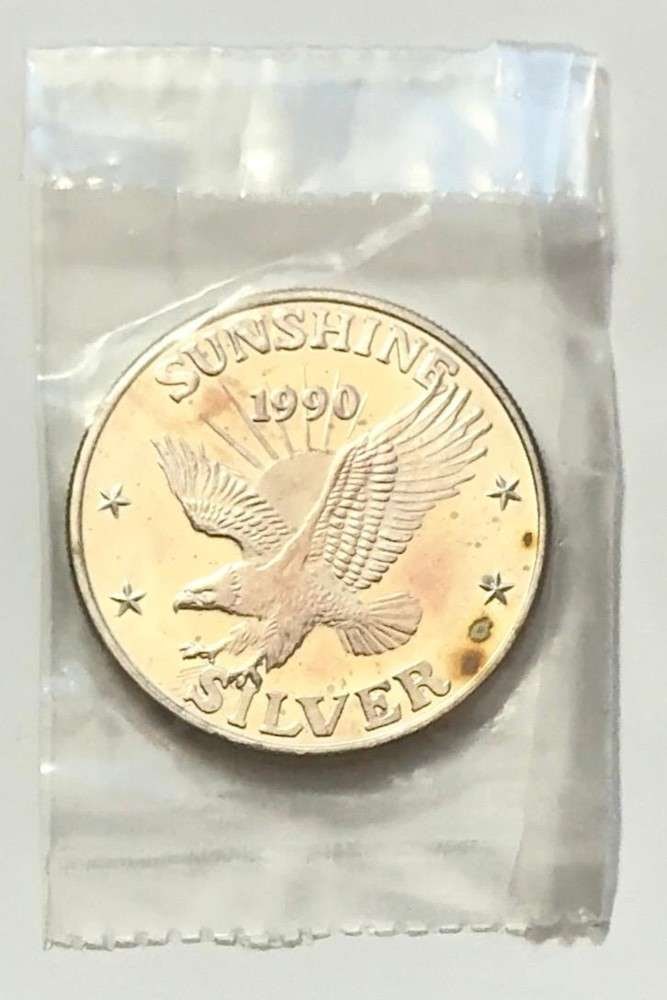 Toned 1990 Sunshine Mining 1 ozt .999 Silver (1 of 3)