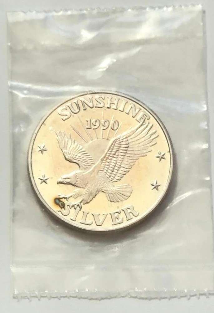 Toned 1990 Sunshine Mining 1 ozt .999 Silver (1 of 3)