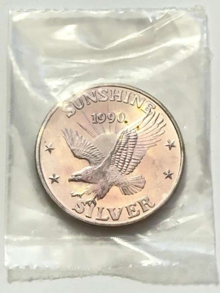 Toned 1990 Sunshine Mining 1 ozt .999 Silver (1 of 3)
