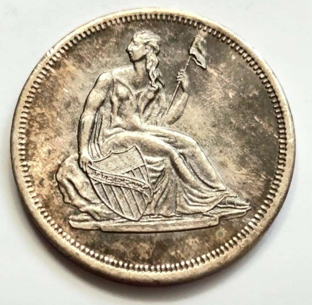 Toned Seated Liberty Design 1 ozt .999 Silver: Winner shall receive the exact round shown here. (SJ/FT)