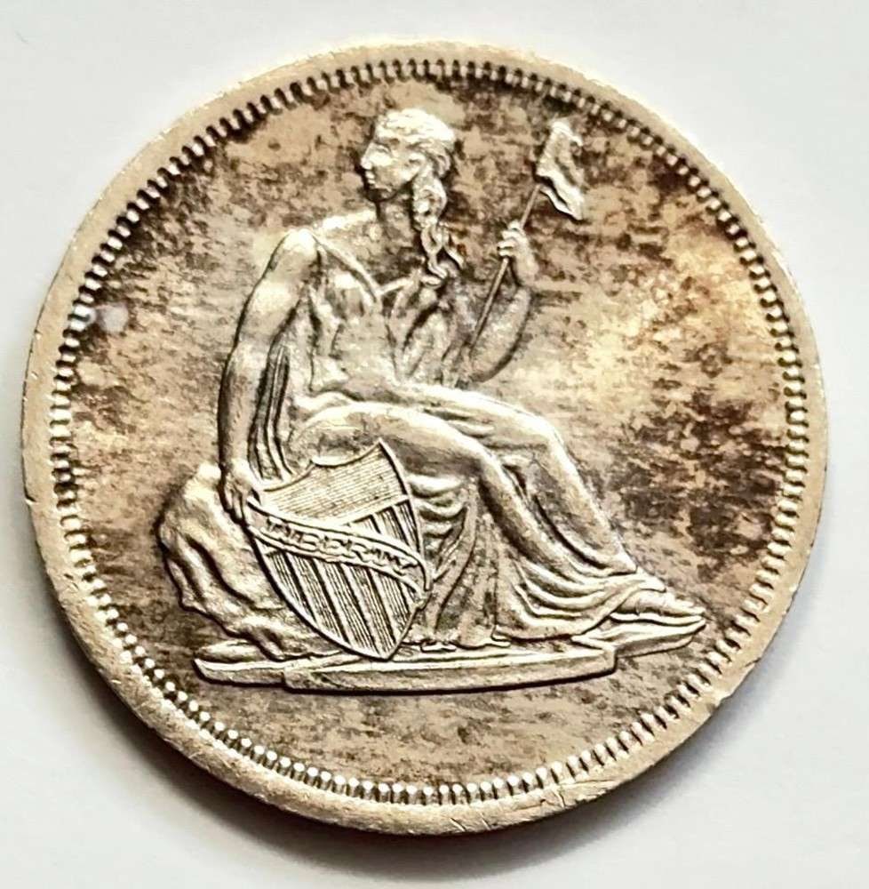 Toned Seated Liberty Design 1 ozt .999 Silver: Winner shall receive the exact round shown here. (SJ/FT)