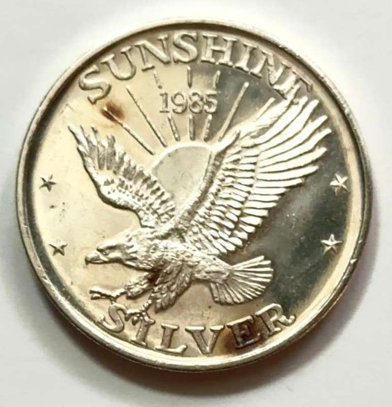 1985 Sunshine Mining Eagle 1 ozt .999 Silver: Winner shall receive the exact round shown here. (SJ/FT)