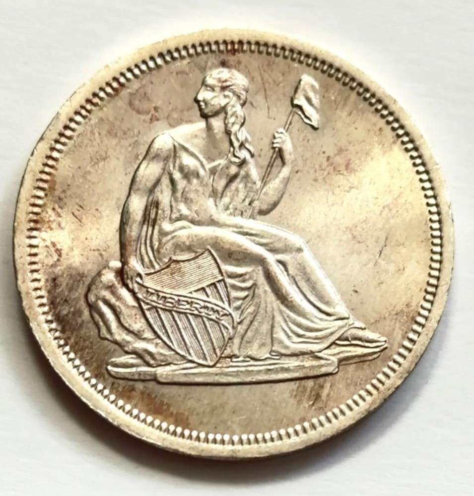 Toned Seated Liberty Design 1 ozt .999 Silver: Winner shall receive the exact round shown here. (SJ/FT)