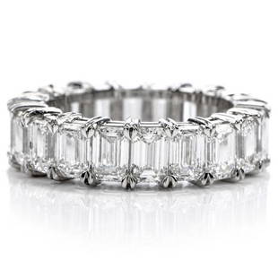 Elegant 6.09CTS EMERALD DIAMOND PLATINUM ETERNITY RING SIZE 5 3/4: 20 Vibrant, Extra White high quality Emerald Cut natural Diamonds wrap around this band from end to end. Total diamond weight : approx. 6.09 carats. All of D,E,F color and from Internally Flawless 