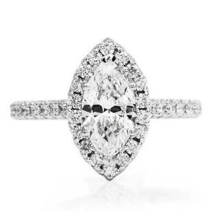 1.18CTS GIA MARQUISE CUT DIAMOND GOLD HALO ENGAGEMENT RING: This classic diamond engagement ring is crafted in solid 14k white gold. Displaying a Center GIA graded 1.18 Carats Marquise cut Diamond, H color, VVS2 clarity. Surrounded by 34 round-Cut Round