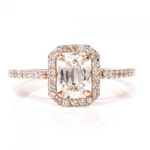 1.83CTTW CUSHION HALO GIA DIAMOND ROSE GOLD ENGAGEMENT RING: This stunning diamond engagement ring is crafted in 18-karat rose gold. Displaying a prominent four-prong set cushion brilliant GIA certified diamond approx. 0.94ct, J color, VVS2 clarity. 0.89