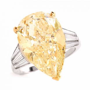 13.41cts GIA Certified Fancy Light Yellow Pear Diamond Platinum Engagement Ring: This ring is beautifully centered with an impressive genuine pear shape, GIA graded natural fancy yellow diamond approx 13.46cttw, extremely nice I1 clarity, set in 18k yellow gold and accented with