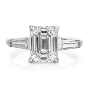 3.41CTS GIA EMERALD-CUT DIAMOND BAGUETTE PLATINUM ENGAGEMENT RING: This beautiful classic diamond engagement ring is crafted in solid platinum. 3.06, J color, VS1 clarity, GIA Graded, prong set. The center stone is accented with 2 genuine baguette-cut diamonds