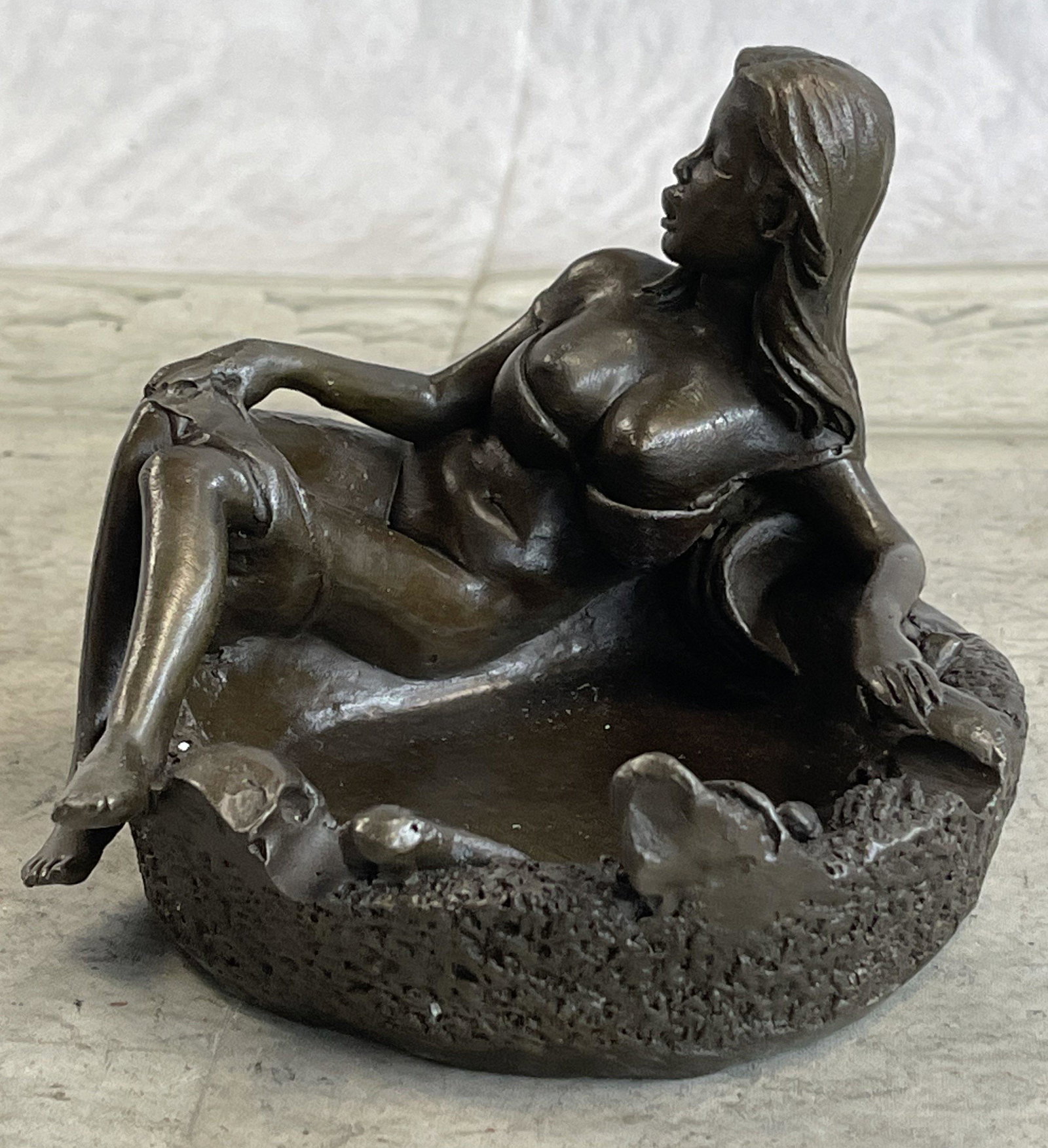 Odegaard Pin Up Girl Ashtray Bronze: Total Dimensions: Height 3'' x Width 5''Approximate Weight: 3 LBSOriginal Reproduction: Reproduction