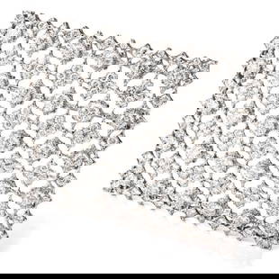Mario Buccellati Vintage Diamond Window of Snowflakes Platinum Brooch: Weighing appx. 19.8 grams, this solid brooch contains diamonds weighing appx. 7.40 carats and are of F-G color and VS1-VS2 clarity.