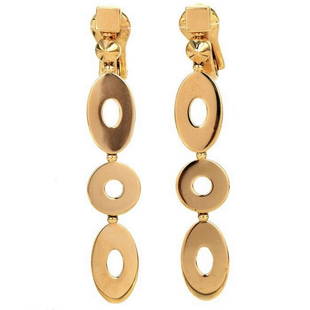 Bvlgari Lucea 18K Yellow Gold Flat Oval Hoop Dangle Drop Earrings: The Lucea Collections is adorned by Round & Oval-shaped flat disc dangle links with a highly polished finish. They measure approximately 2" x 10 mm, are secured with Omega clip-on backings for non pie