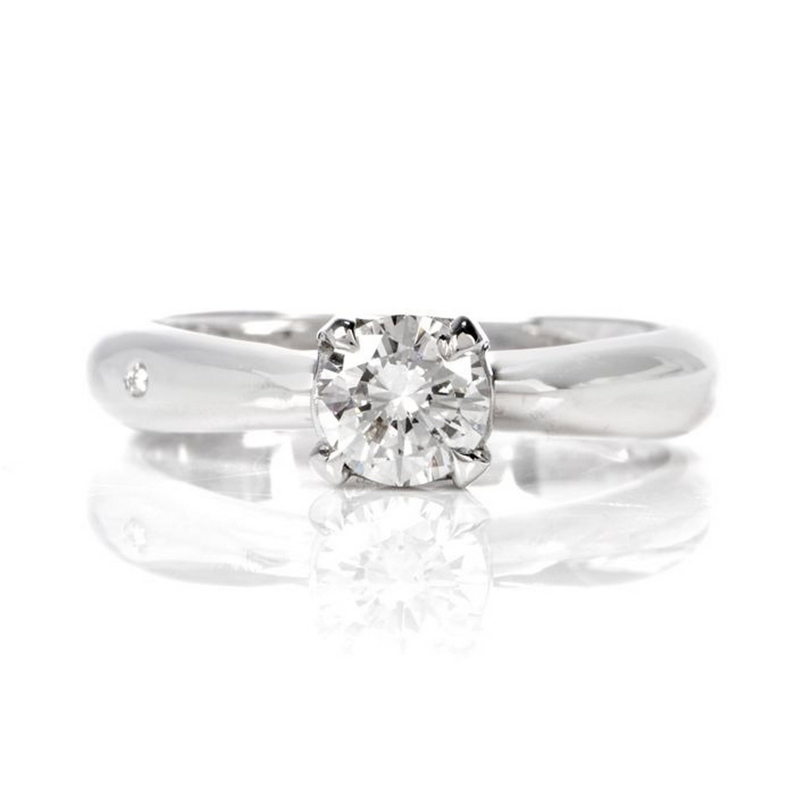 Chimento Diamond 18K White Gold Italian Engagement Ring: This classic diamond Italian made engagement ring is crafted in 18-karat white gold. Centered is a single prong set round-brilliant diamond weighing approximately, 0.57 carats, graded H color, and VS1