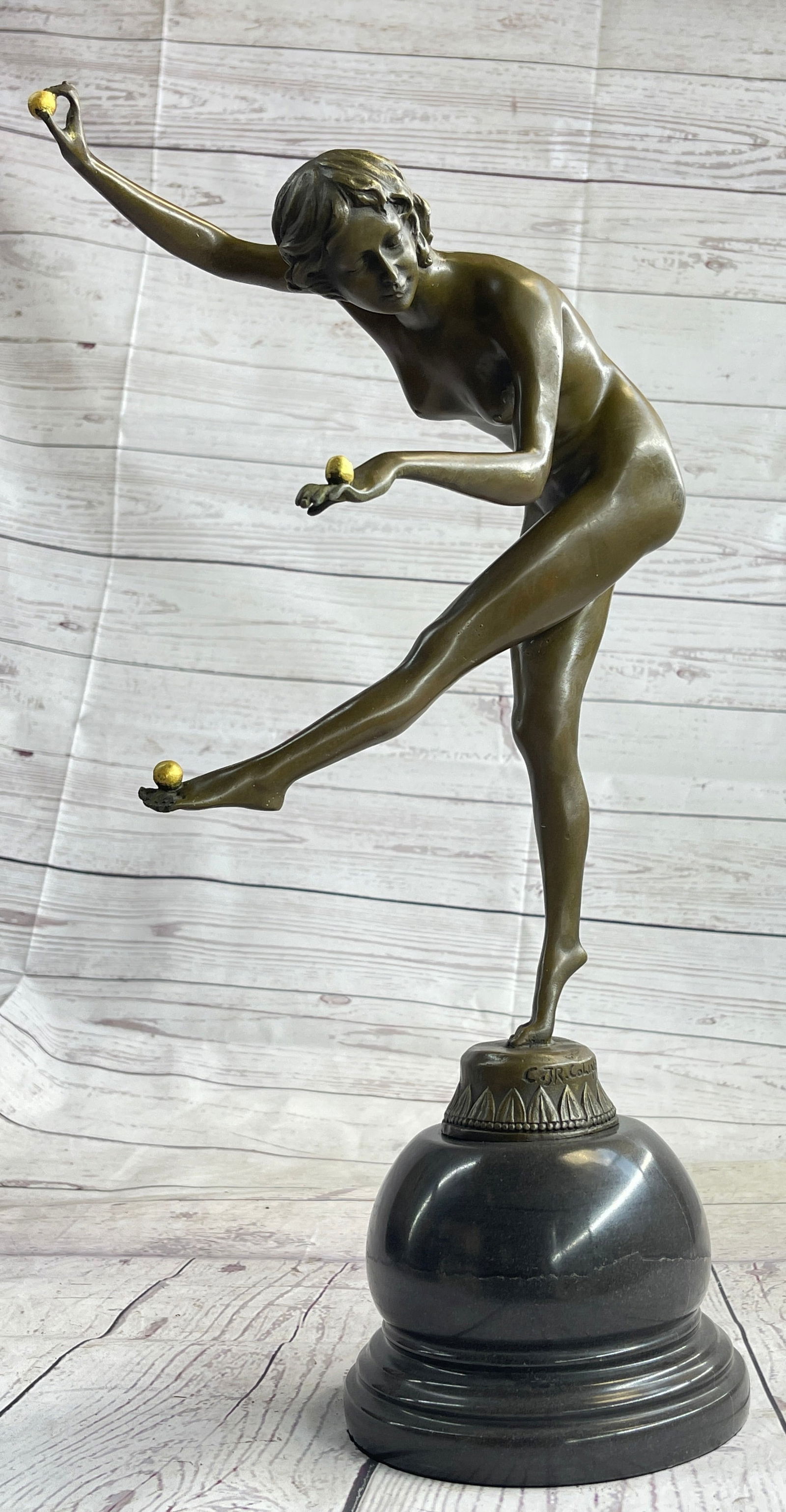 Nude Female Juggler Dancer - Art Deco Bronze Sculpture by Claire Colinet: Bronze Dimensions with Marble Base: Height 18 X Width 10Marble Dimensions: Diameter 6Height without base:14Weight:13 LBS. Original or Reproduction: Reproduction