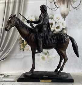 Native American Man with Horse Sculpture