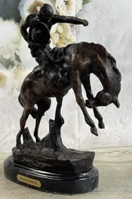 Remington "Charles Russell" Rodeo Statue