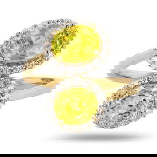 3.99ctw Yellow Sapphire and 0.40ctw Diamond 18K Yellow Gold Ring: One electronically tested 18KT yellow gold cast yellow sapphire & diamond ring. Each of the featured sapphires are set within a diamond bezel, supported by a ribbed under gallery, completed by a two m