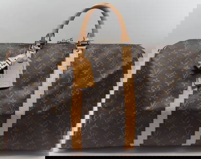 Louis Vuitton Monogram Keepall 50: Grade AB+. Extremely Faint Crease and Soil on Vachetta Straps