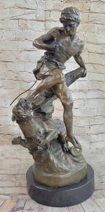 Signed Barye Muscular Man Defends himself against Lion Bronze: Total Dimensions: Height 22'' x Width 14''Approximate Weight: 40 LBSOriginal Reproduction: Reproduction
