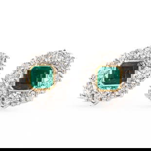 4.75ctw Emerald and 1.82ctw Diamond 18K Yellow Gold Stud Earrings: One electronically tested pair of platinum & 18K yellow gold earrings marked Oscar Friedman. The earrings are mounted with: 2 genuine emerald center stones weighing approximately 4.75 carats. and 104