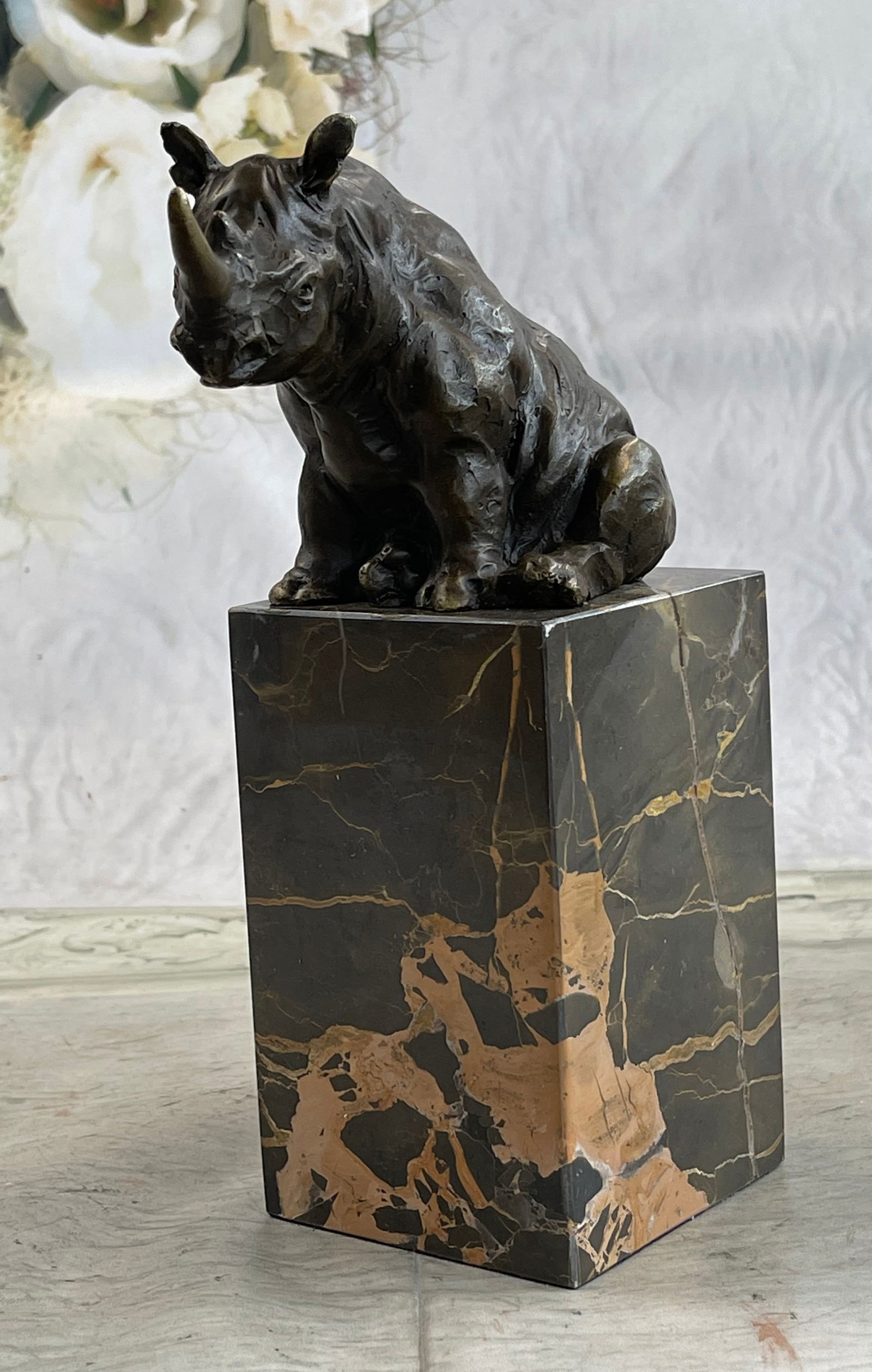Milo Rhino Marble Base Bookend Bronze: Total Dimensions: Height 9'' x Width 6''Approximate Weight: 7 LBSOriginal or Reproduction: Original