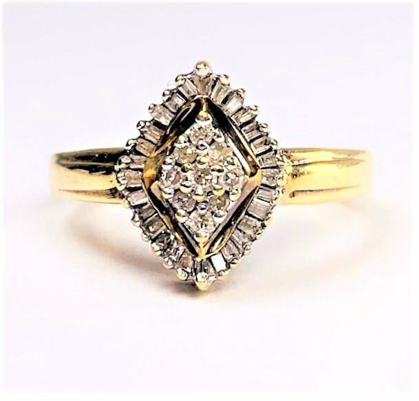 10K Yellow Gold Diamond Baguette Estate Ring: The ring is a size 6.5 and weighs 3.32 grams