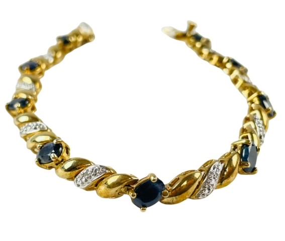 Sterling 10K Plating Brace w Sapphires & Diamonds: The bracelet weighs 14.51 grams and is 7.5 inches long with a double safety clasp