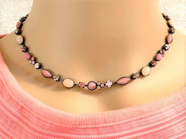 Pink Vintage Stone & Crystal Swarovski Necklace: Silver plate in Oxi Black with Pink Opal and Pink Opaque Swarovski Vintage stones & Swarovski Crystal Necklace. Chain extends 14.5 to 17 inches. Made by Designer Dagmar Paulus in Berlin, Germany.