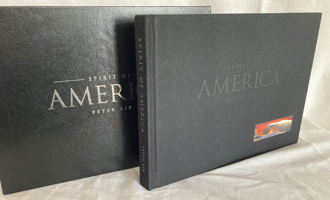 PETER LIK Signed LIMITED EDTION PRINT Spirit of America: Up for auction is a signed, limited edition book and print by renowned photographer Peter Lik entitled Spirit of America. This beautiful production was published by Wilderness Press in 2003. Only 2,50