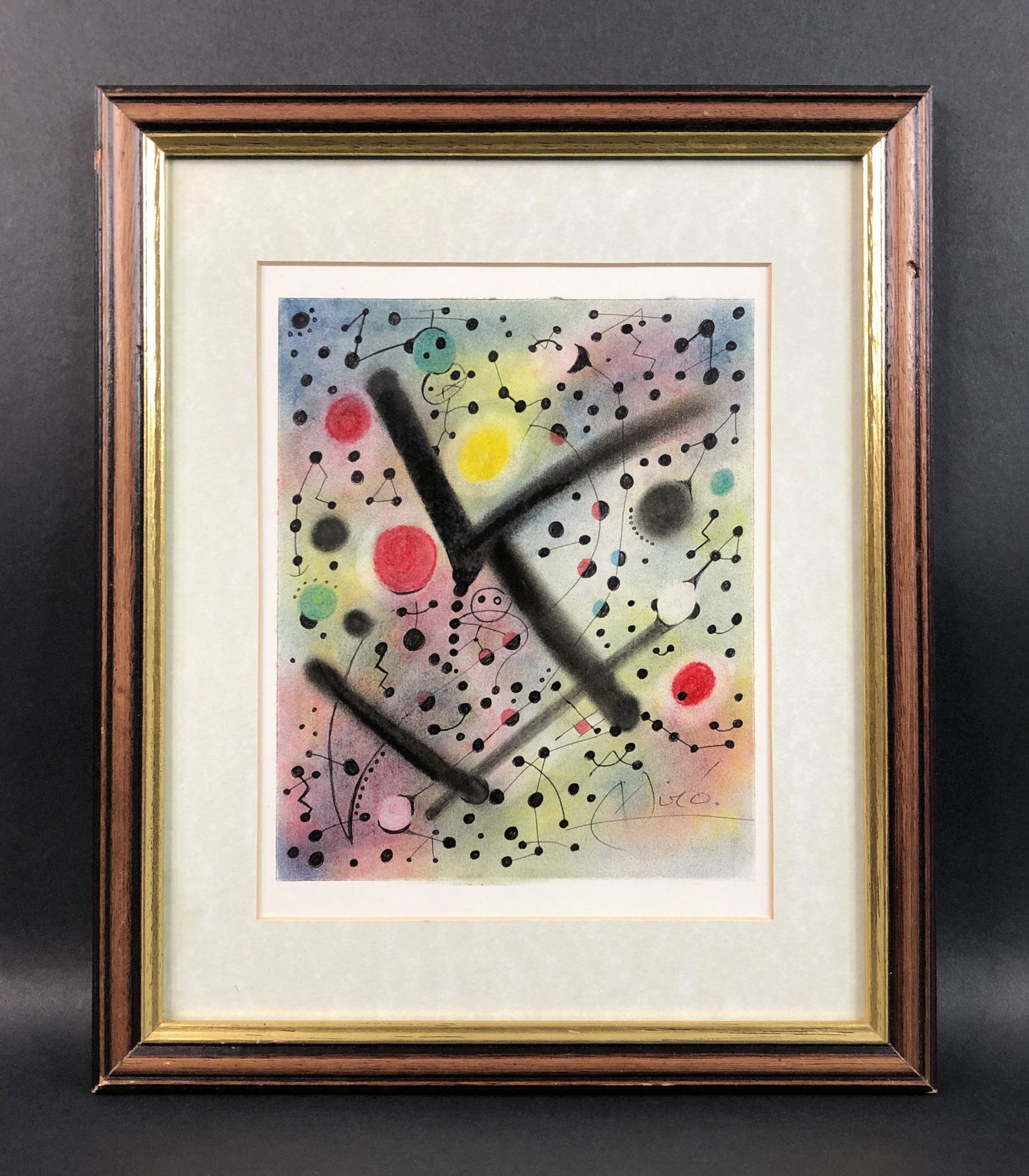 Joan Miro (Spanish, 1893-1983) Watercolor on Paper: This lot consists of a watercolor on paper, framed under glass, and done in the style of modern abstract artist Joan Miro (Spanish, 1893-1983). Handwritten graphite inscription at lower right reads, "