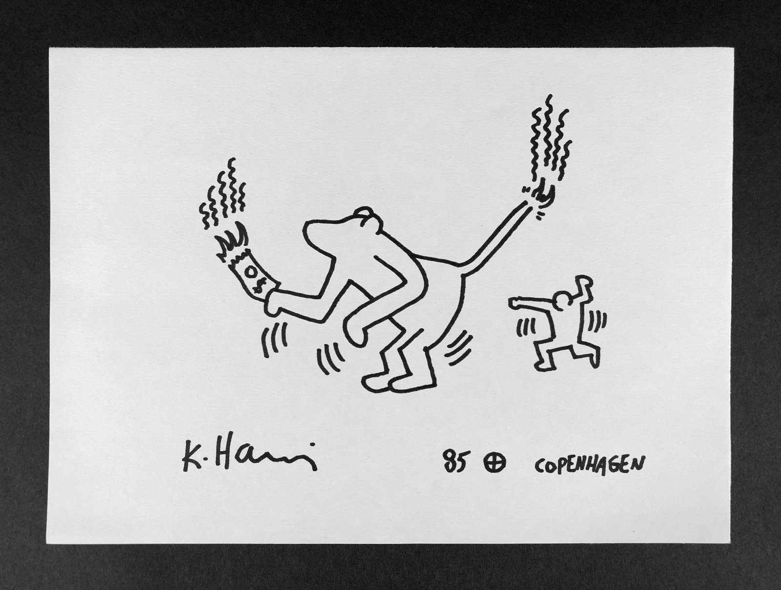 Keith Haring (American, 1958-1990) Ink on Paper: This lot consists of an unframed marker illustration on paper. This simple yet powerful depiction is executed in the contemporary, street art style of pop artist Keith Haring (American, 1958-1990). Ha