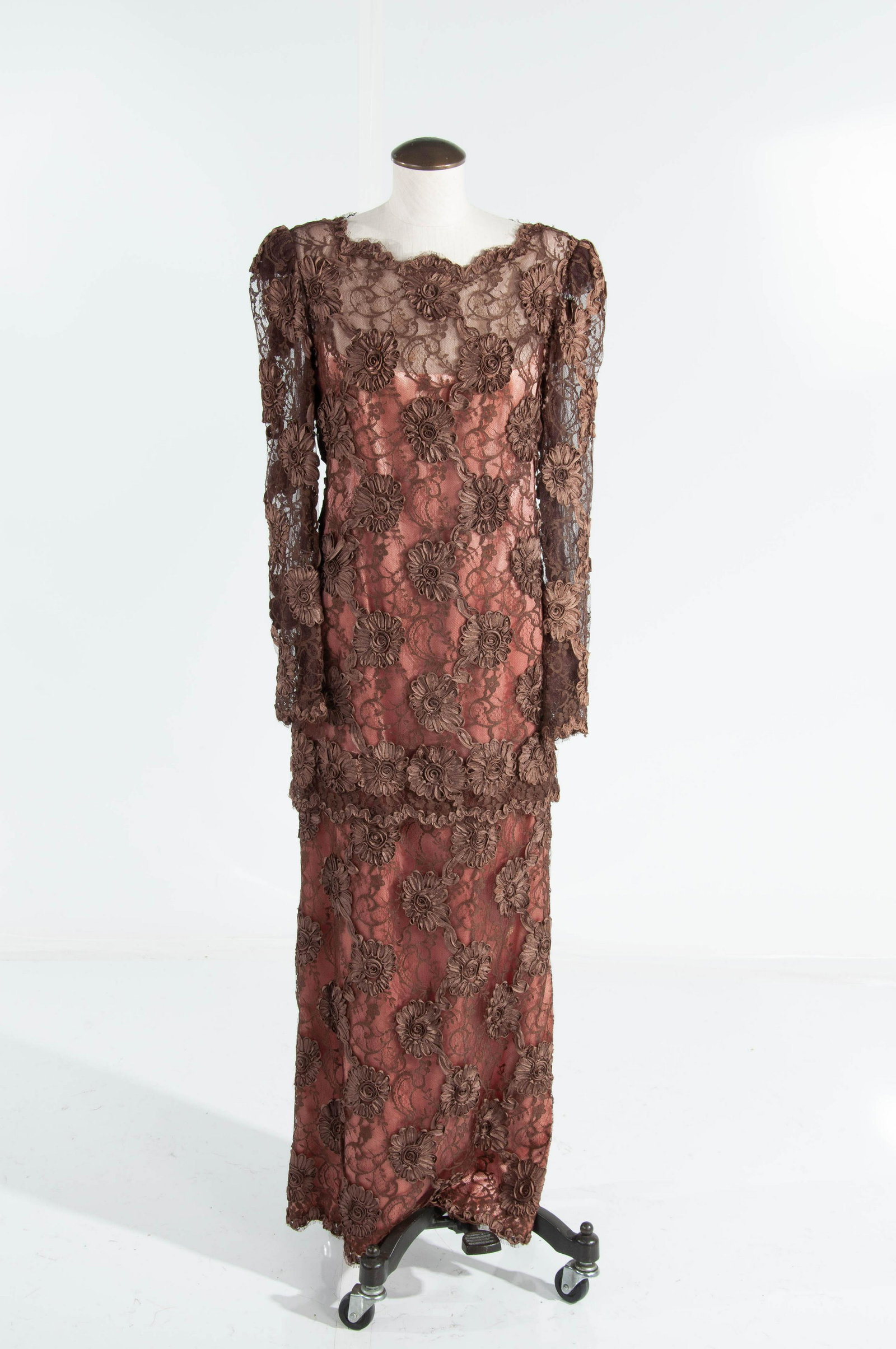 Michael Navarese Floret Lace Gown Brown/Peach: Front Collar to Bottom 53.5", Shoulder to Shoulder 18", Chest 15", Collar to Cuff 28.5", Shoulder to Cuff 26", Pit to Pit 19", Pit to Cuff 16.5", Pit to Side Bottom 46", Back to Bottom 56", Front Shel
