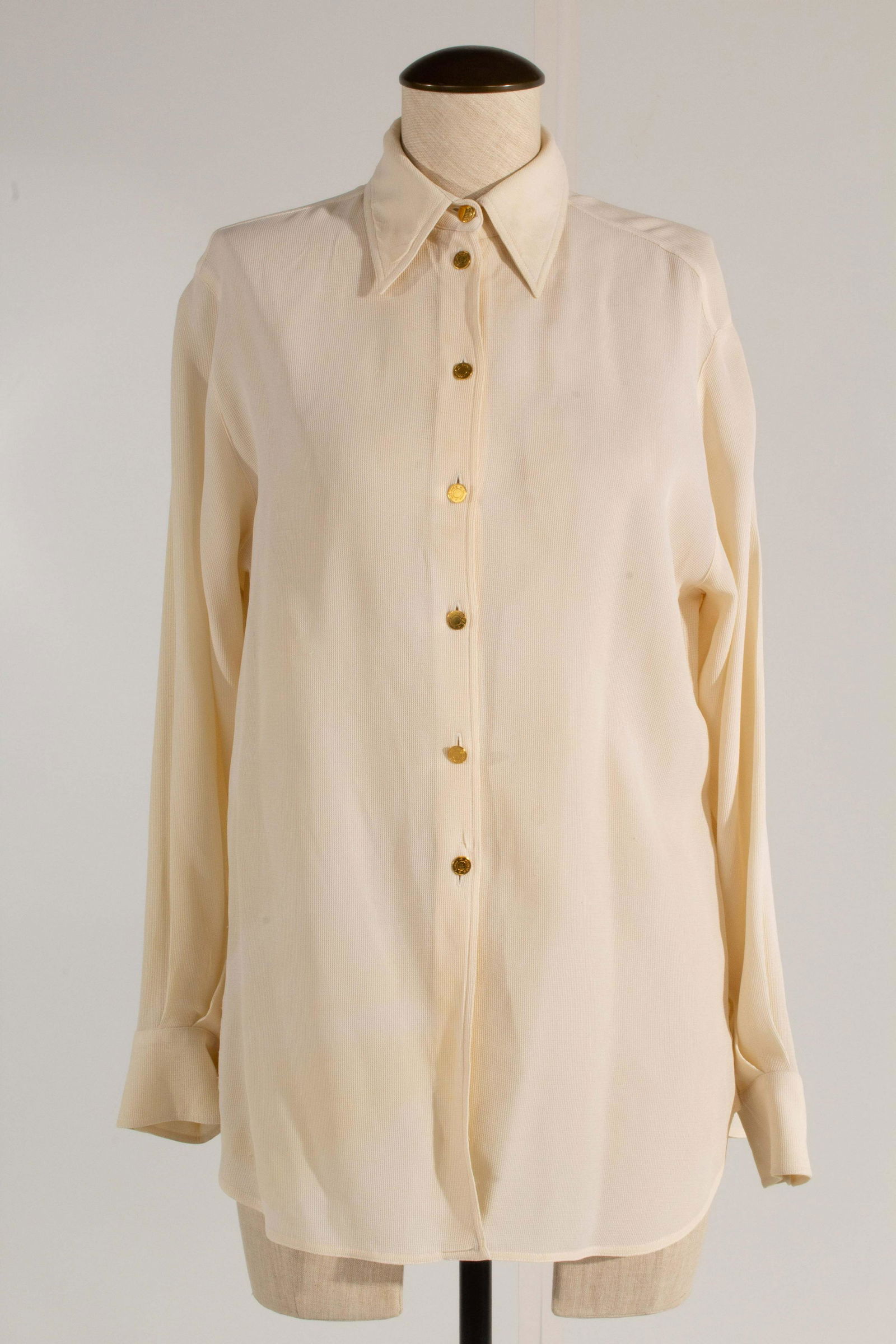 Hermes Linen Blouse Cream Size 40 with Logo Buttons: Hermes Cream Linen Blouse with Gold Logo Buttons Some staining. (See Photos), Front Collar to Bottom: 26" Back Collar to Bottom: 29.5", Collar to Shoulder: 6.5", Collar to Cuff: 29", Chest: 31", Pit t