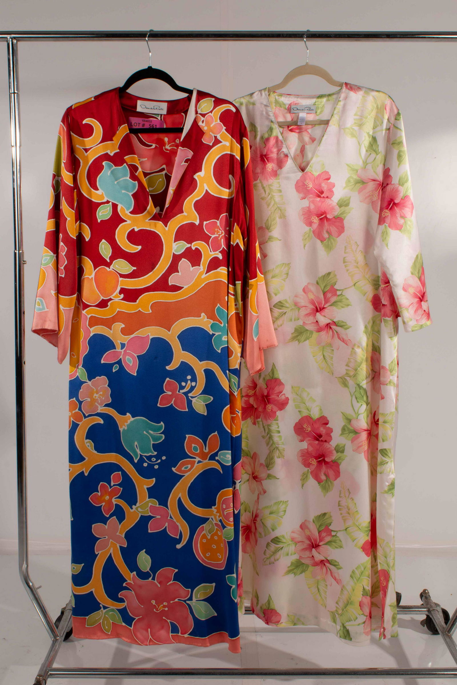 Oscar De La Renta Lot of 2 Caftans (spots): Oscar De La Renta Lot of 2 caftans (spots, Need Dry-Cleaning); (RED ORANGE BLUE DRESS) Size 12: FRONT: 53.5; CHest17.5; Pit-Pit:22.5; Collar-Cuff:27; Pit-Cuff:13; Shoulder- Shoulder:17.5; Top Back-Bot