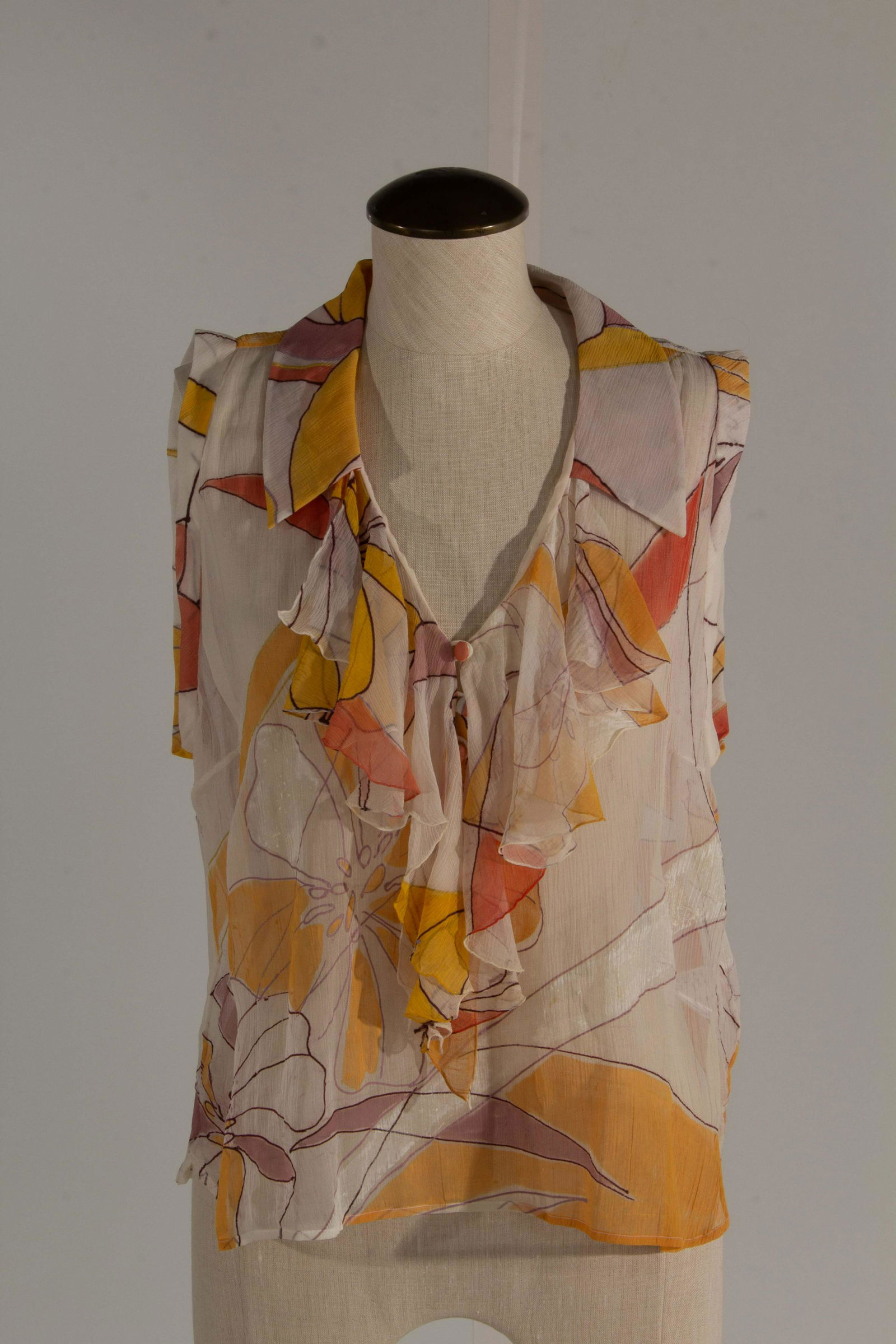 Brioni Silk Gauze Top Size 46 Floral Motif: Brioni Silk Gauze Top Floral Motif SIZE 46 ; front cleavage to bottom 14" ; back collar to bottom 21" ; front shoulder seam to bottom 22" ; collar to shoulder 4" ; shoulder to shoulder 14.5" ; pit to
