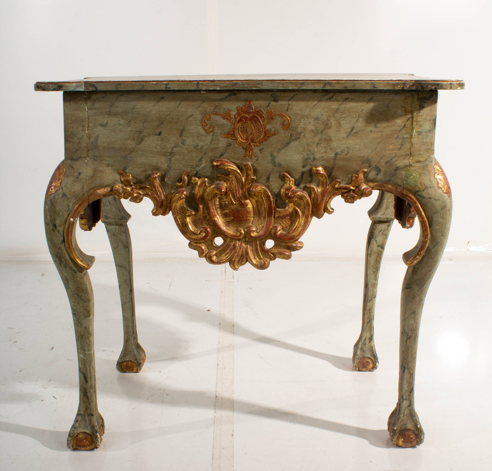 Gilded Side Table: Stylistically distressed surface. Minor separation of joinery, doesn't affect structural integrity. Wear and distress to painted surface. Some scuff marks.