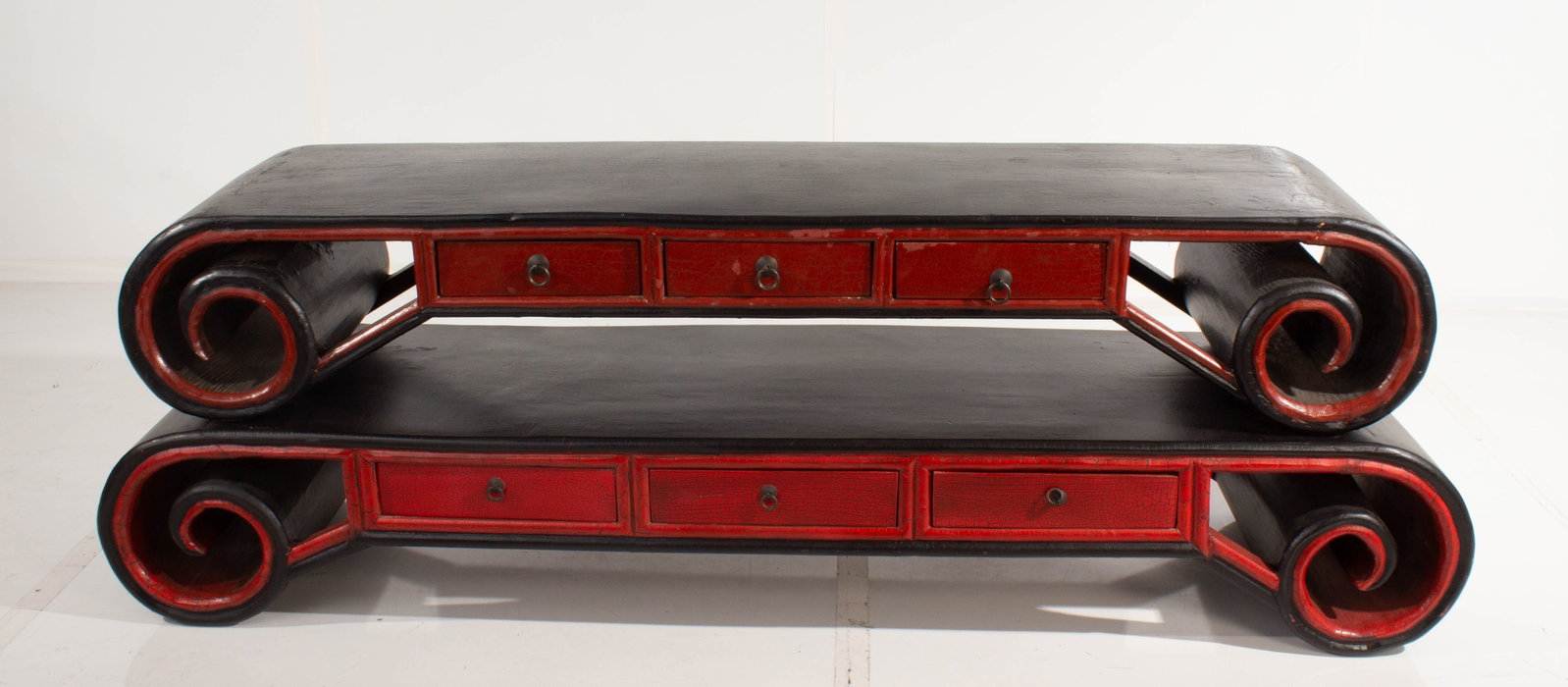 Asian Kneeling Tables (Set of 2): Some scuffing, distress, and worn areas of paint. Some chips and scratches to paint. Large: 13"H 76"W 20"D. Small: 12"H 70"W 17"D