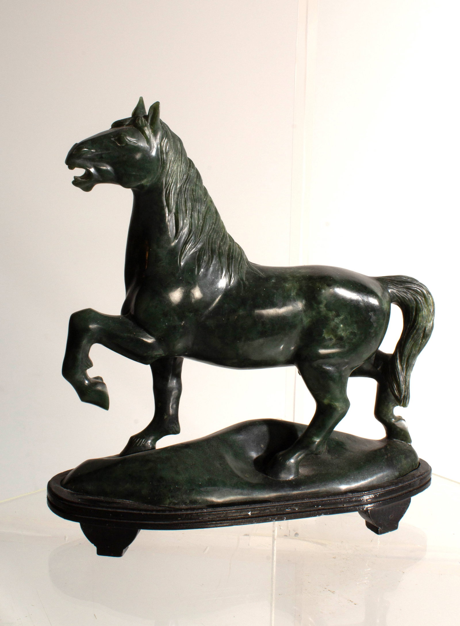Jade Stomping Horse Statue: Jade Statue of a Prancing Horse