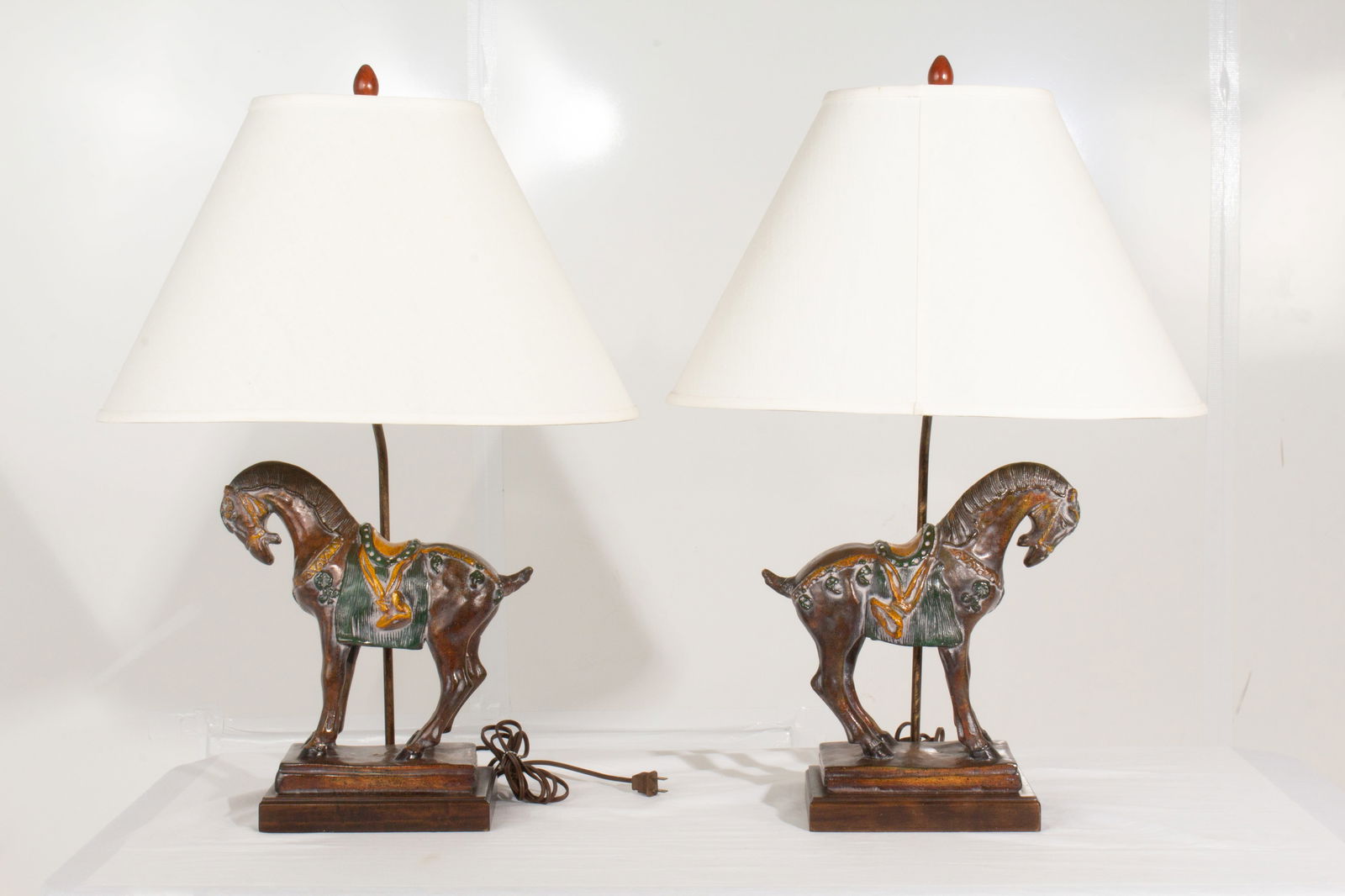 Frederick Cooper Ceramic Horse Lamps Pair: Pair of lamps with 84" cord. Shade dimensions: 13"x20"x14.5".